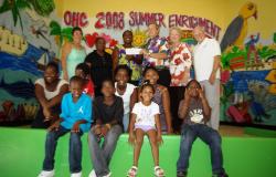  Lori Bailey, manager of the VIGFC (far left), Jacqueline Brown, director Boys & Girls Club of St. Thomas (third from left), Jeff Kreiner, JOBT tournament director (fourth from left), Sue Boland, VIGFC Board President (fifth from left), Harry Clinton, VIGFC Board Member (far right).