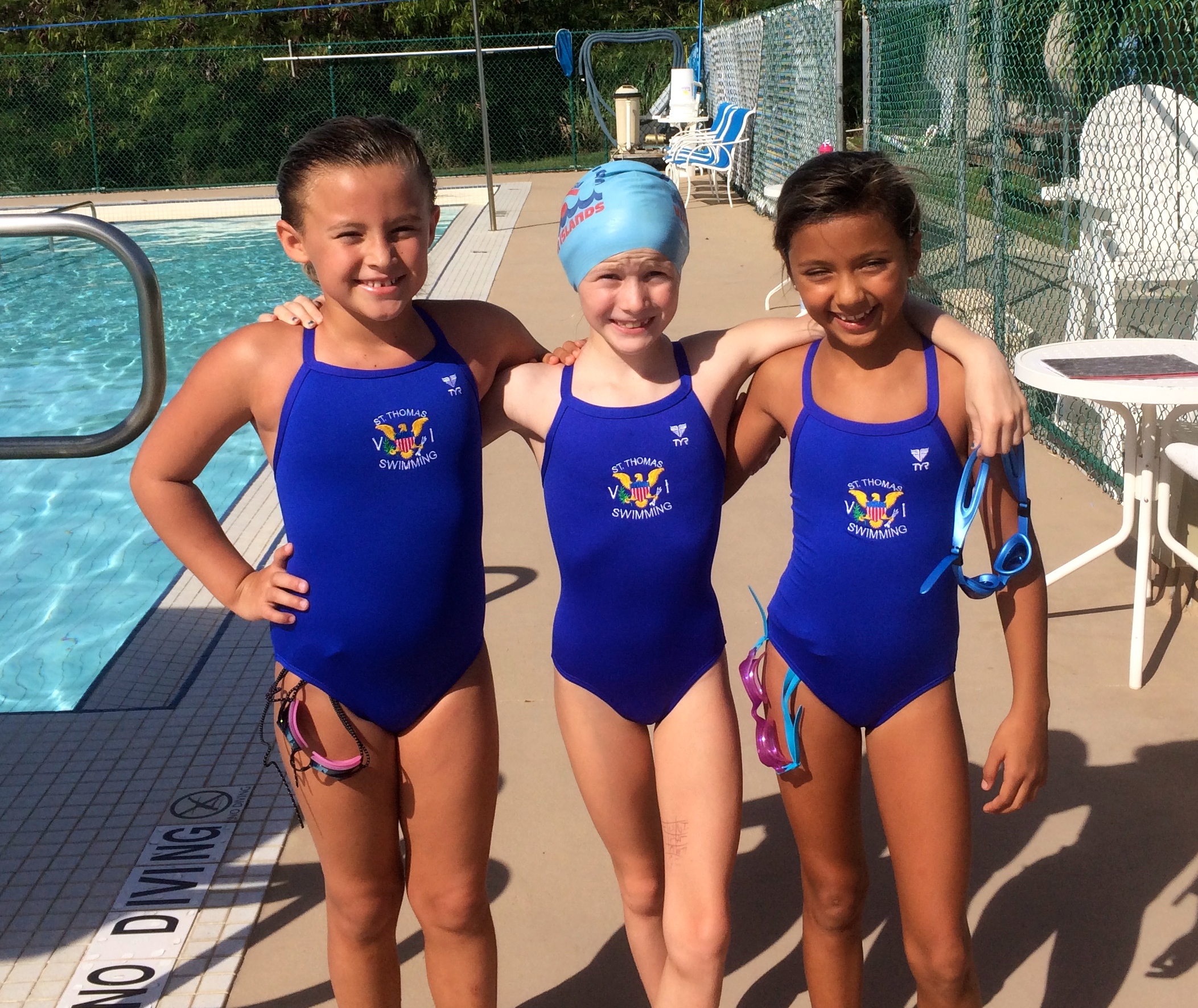  STSA Stingrays Sasha Poe, Fion Hughes and Khalia Moore are accomplished competitive swimmers in the 10 and under group. (photo by Kelly Moore)