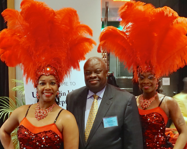 Gov. Kenneth Mapp with two dancers from the USVI.