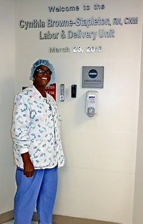 Cynthia Browne Stapleton stands at the labor and deliery unit named for her.