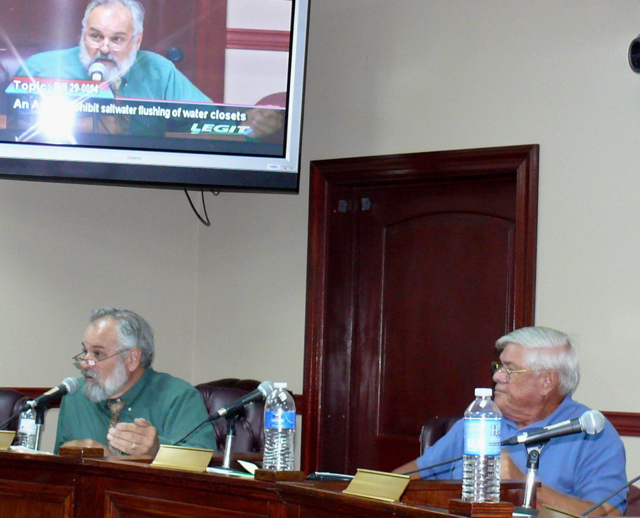 St. Croix Environmental Association Executive Director Paul Chakroff, left, testifies to the Legislature Thursday while SEA Chairman Ken Haines listens.