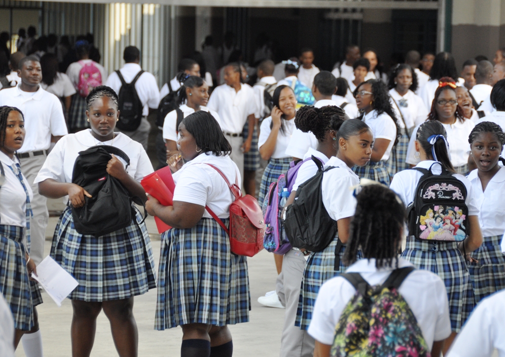 Complex students gather between classes on school's first day.