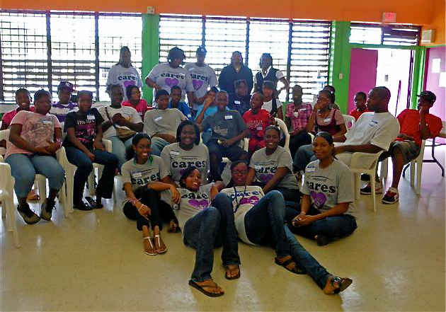 Students and interns fill the brightly painted community center.