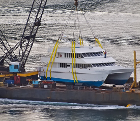 The damaged Royal Miss Belmar being brought into West Gregarie Channel off St. Thomas.(Jim Wilkinson, Water Island Photos)