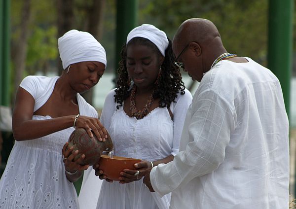 Ja'Nel Harrigan, Jahweh David and Myron Jackson during the rites of passage ceremony.