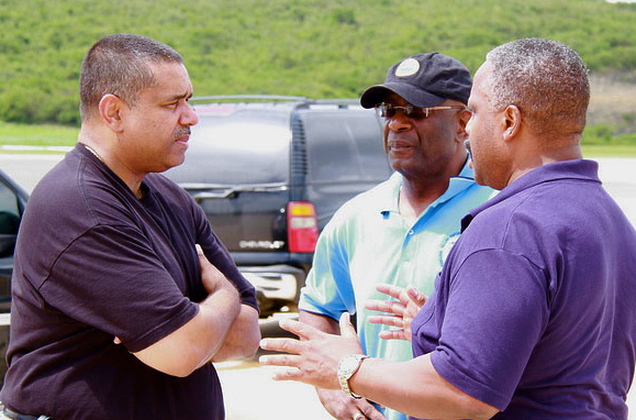 Gov. John de Jongh Jr., VITEMA Director Elton Lewis and  FEMA Coordinating Officer Phil Parr discuss Tuesday's inspection.