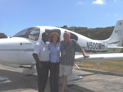 From left, St. Thomas Jet Center general manager Roy Romney, Susan Hancock and Michael Hancock.