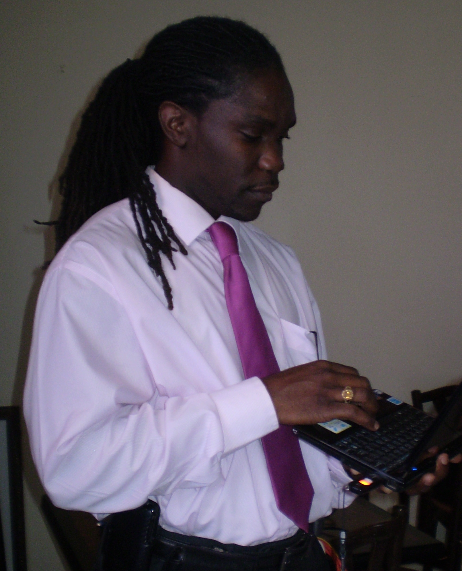 Featured speaker Jason Henry painted chilling scenes of the devastation in and around Port-au-Prince.