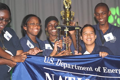 The St. Croix Education Complex team is all smiles as it holds its trophy Sunday on St. Thomas.