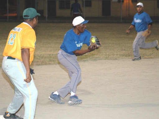 Alejandro Rivera of the Warriors snags a hot shot at third on the front end of a double-play.