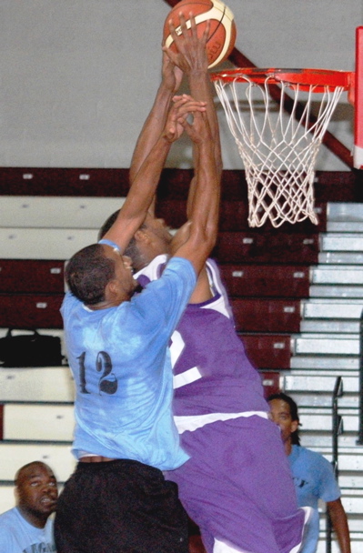 Robert Pack's soaring two-handed jam put emphasis on the Lakers' domination.