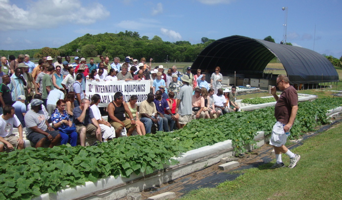 James Rakocy, right, organizes this year's 92 participants for a "class picture."