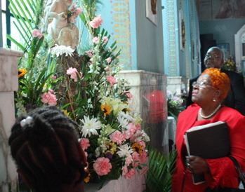 Visitors to St. Peter and Paul Cathedral take in the decoations for the church's first Flower Festival.