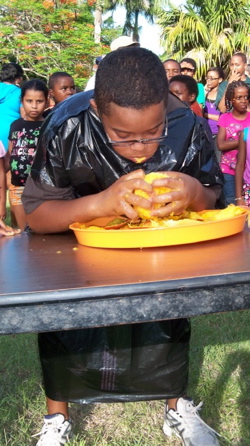 Mango-eating champion Adrian Pierce battles to keep it down.