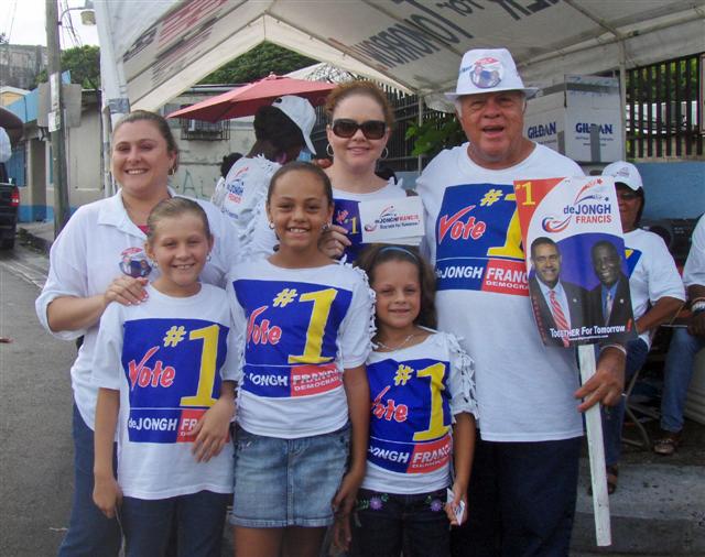 Posing in Frenchtown, deJongh-Francis supporters Henry Richardson (right) and family .