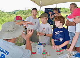 William Coles talks to Boy Scouts about the wildlife in Southgate pond.