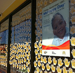 Paper hands cover the windows of McDonald's in Lockhart Gardens Shopping Plaza. (Photo courtesy MLB Creative)