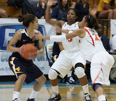 Virginia and West Virginia face off during the Paradise Jam women's tournament.