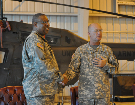 VING Col. Aubrey Ruan (left) thanks CW4 Richard Wienches for his service.