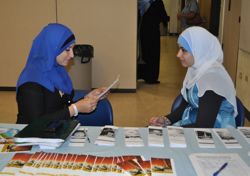 MSA President Eman Abdelghani and member Heba Abdallah discuss the fasting challenge with each other.