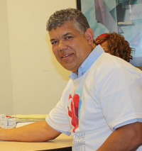 Scotiabank Vice President Lawrence Aqui participated in Friday's free clinic.