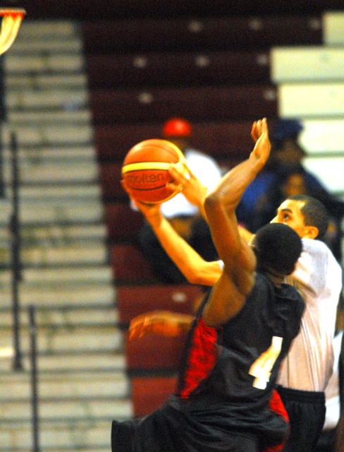 Legacy’s Bobby Evans drives past Boys Dem's Salim Ross