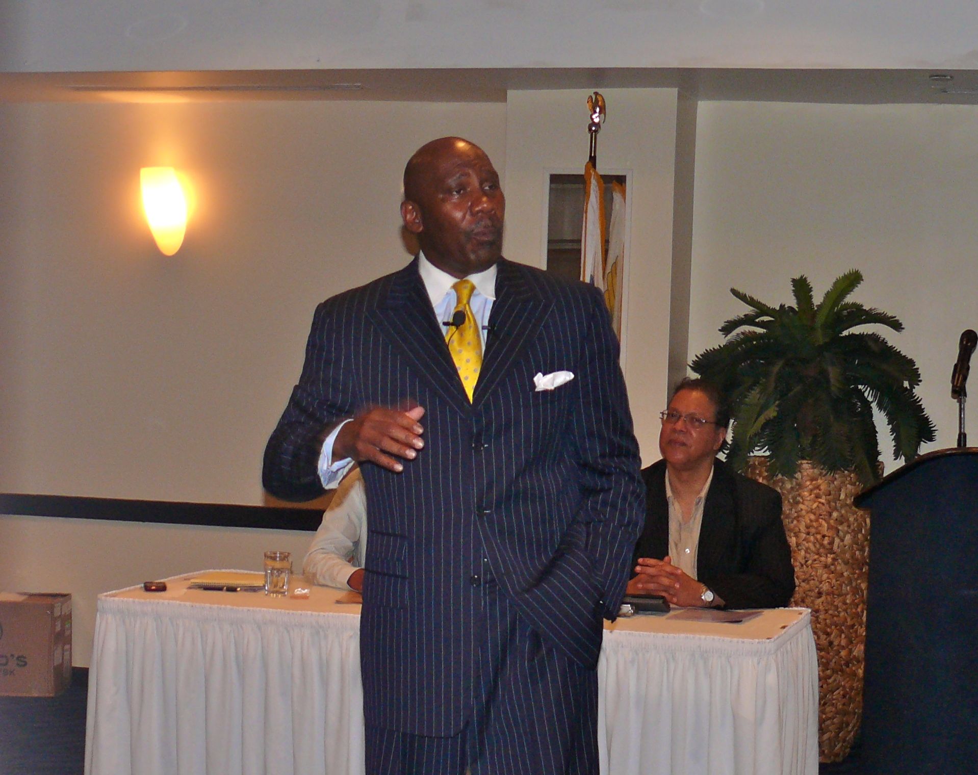 Motivational speaker Columbus Copeland looked to inspire laid-off workers during Monday's event at Divi Carina Bay Resort.