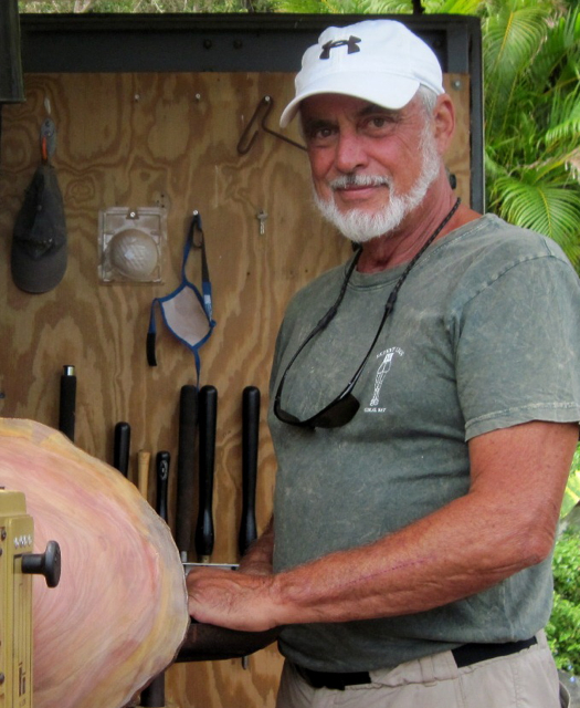 Hal Usher turns wood in his St. John workshop.