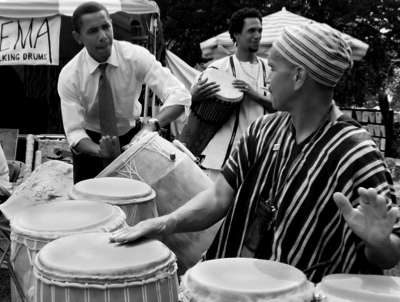Baba Tyehimba Mtu, right, drums with a young Barack Obama in this file photo. (Photo courtesy of Pan African Support Group)