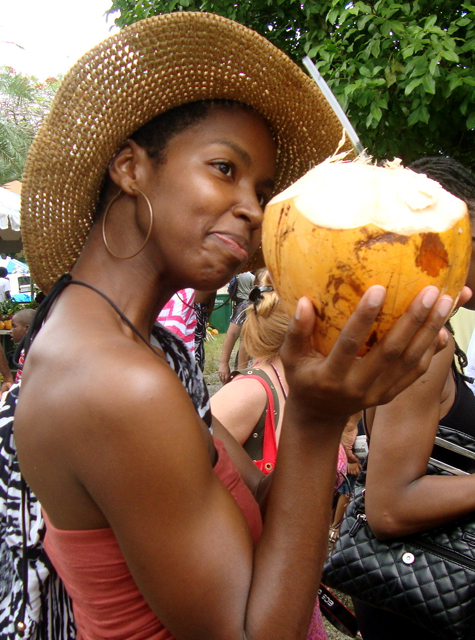 Abeje Maolud-Sneed, who recently moved to St. Croix from Berkeley,Ca., enjoys a coconut.