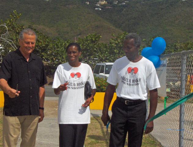 CFVI Chairman Ricardo Charaf (left), and Josephine and Chester Hodge of Nigel Hodge Foundation cut ribbon for Learning Trail.
