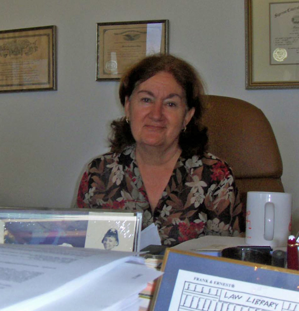Maria Tankenson Hodge at her office desk.