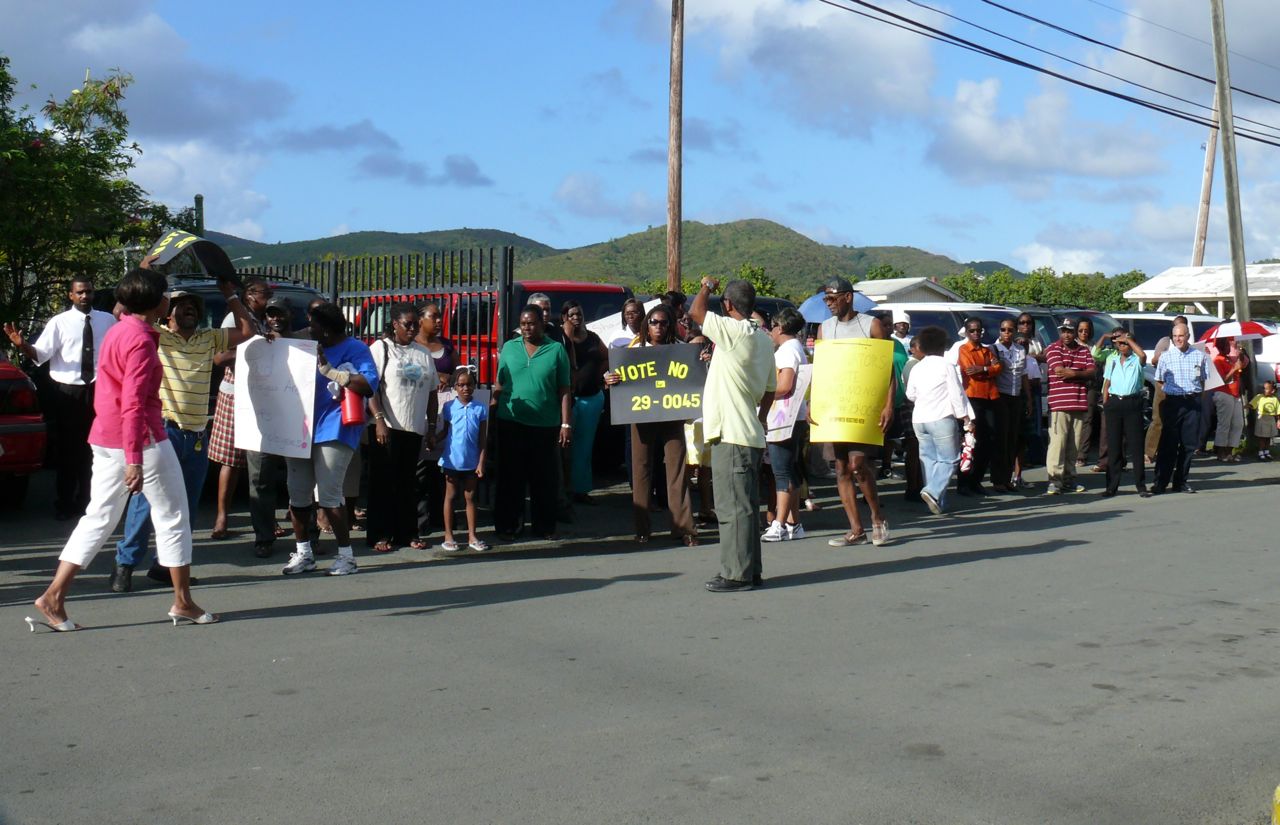 St. Croix teachers protest Wednesday against proposed cuts in paid holidays and new powers over payroll contained in austerity legislation coming before the V.I. Legislature Thursday.