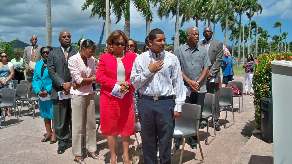 Sheen's widow, Jada Finch-Sheen (dressed in red), was joined by a host of UVI officials and well-wishers for the naming ceremony.