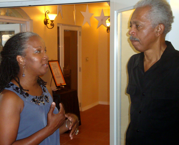 Coalition board member Sandra Setorie chats with Wallace Williams.