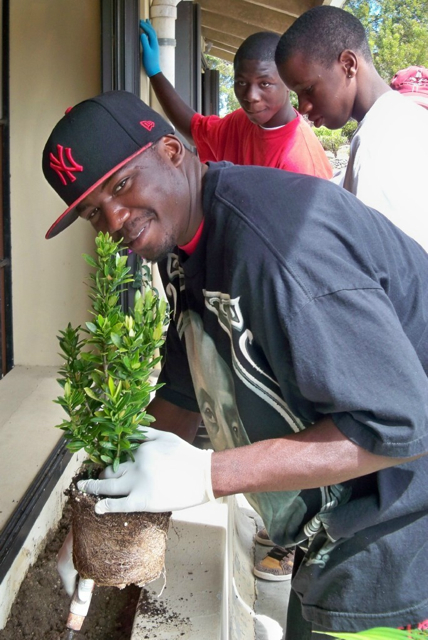 From left, Latrell Jacobs, Deray Roberts and Mak Lopez landscape.