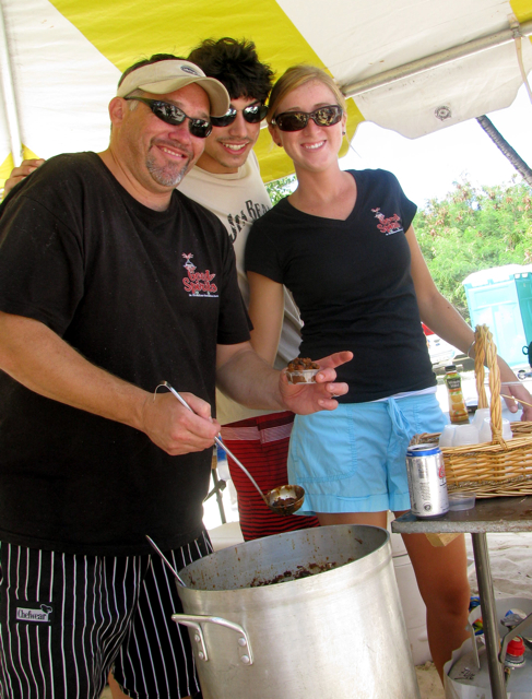 Dave Trask, left, and his team from Good Spirits restaurant serve up his chili at the 10th annual Chili Cookoff.