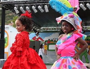 Kalieh Rondon, left, and Taezha Maduro show off their Best Dressed Doll costumes.