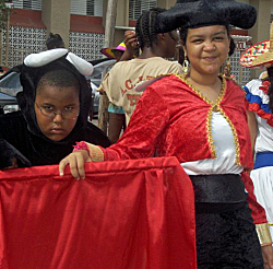 A fearsome bull and matador from Team Mexico at the book parade.