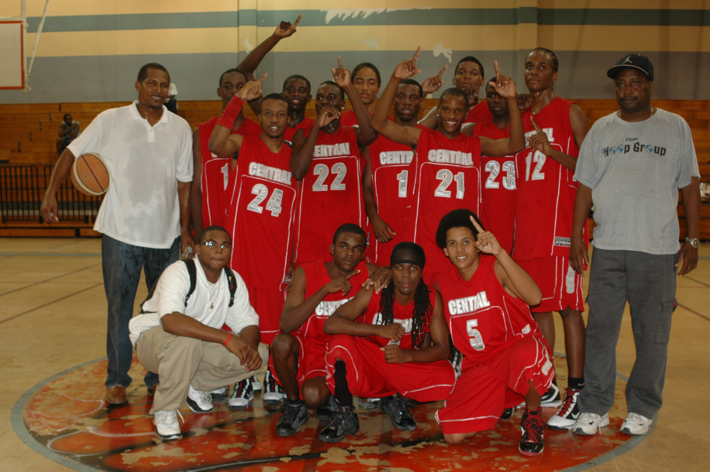 The Caribs boys strike a winning pose after defeating the Barras.