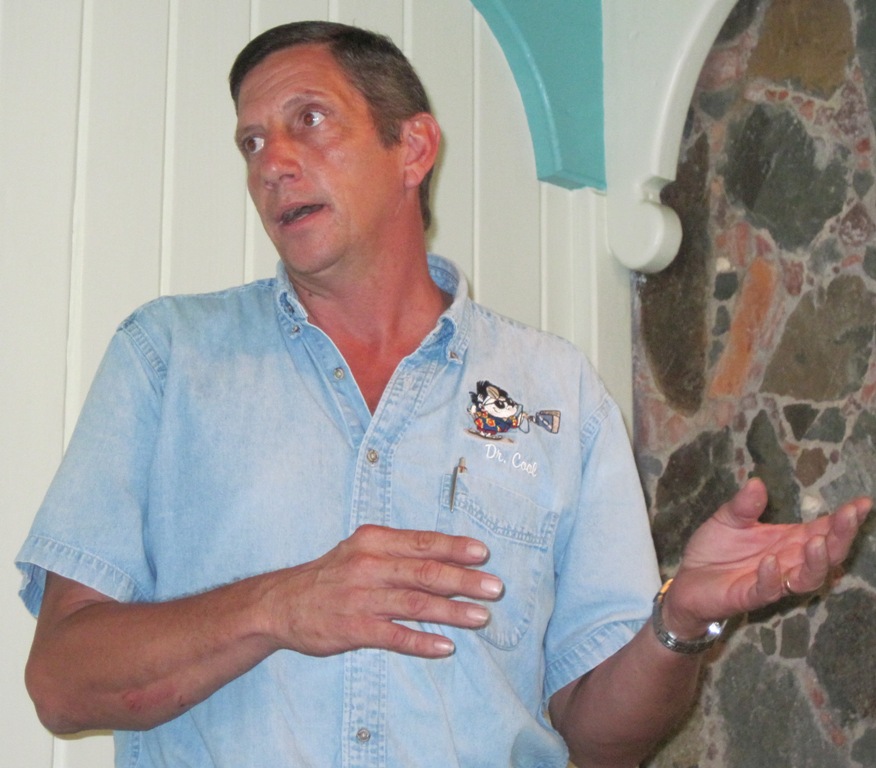 Dr. Cool's Gary David touting the benefits of solar-assisted air conditioners.
