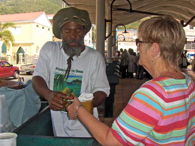 Visitor Cathy Crosby samples Jambie’s pumpkin soup.