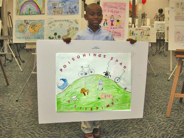 Joshua Schulterbrandt and his winning poster. (Photo by Tanya Schulterbrandt)