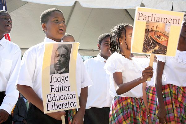 Gladys Abraham Elementary School students give residents a lesson on D. Hamilton Jackson.