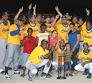 Stealers celebrate with the championship trophy and fans.