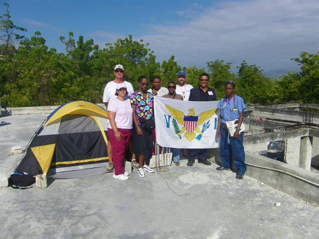 Hans Oriol (second from right) with the USVI Haitian Relief group on Haiti Community Hospital roof. (Photo by Hans Oriol)