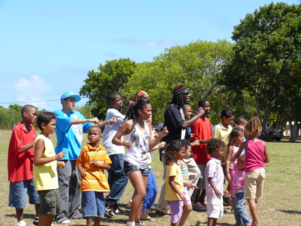 Toussaint and the kids dancing for the video shoot.