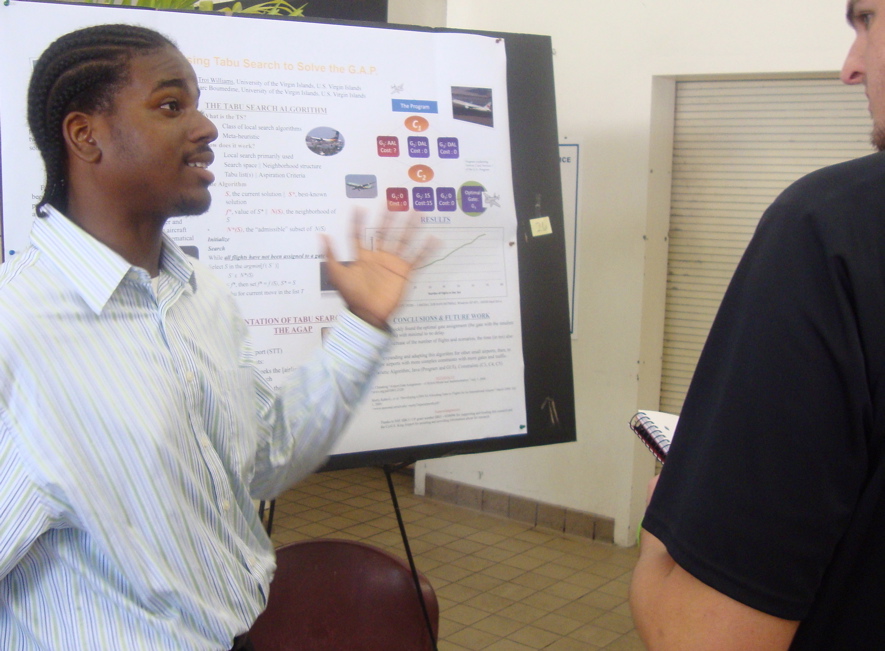 Troi Williams explains his project on the "Gate-Assignment Problem" at Saturday's UVI Spring Symposium.