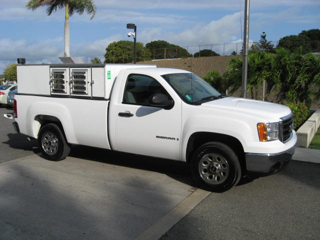 The center's new pickup donated by Hovensa, with the animal control unit on the back. (Photo courtesy Hovensa.)