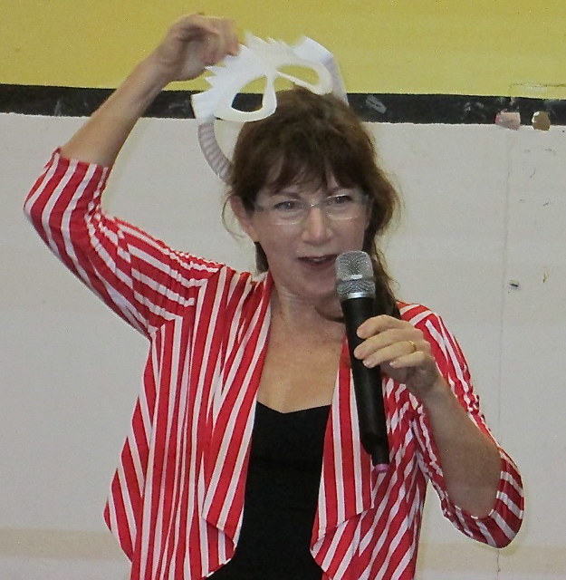 'Wacky Wendy' dons a paper-plate mask.